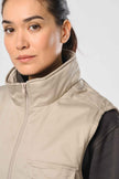 WK607 - Gilet polycoton multipoches rembourré unisexe WK. Designed To Work